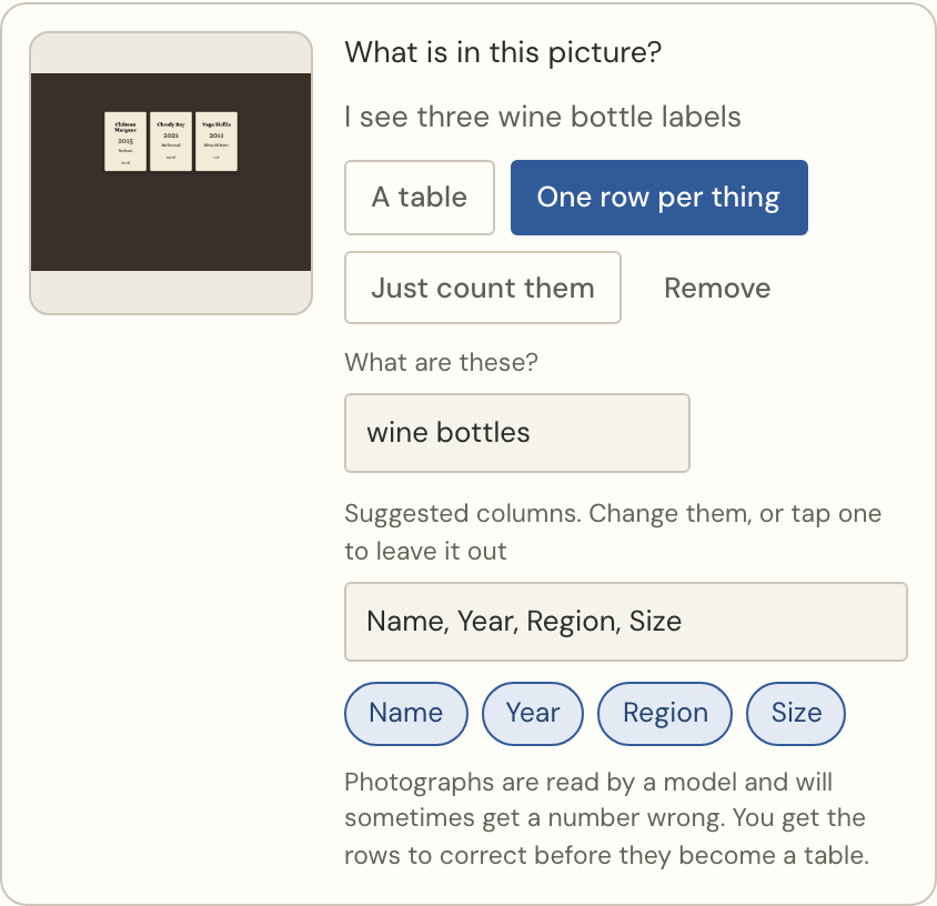 A photo of three wine labels, with suggested columns Name, Year, Region and Size